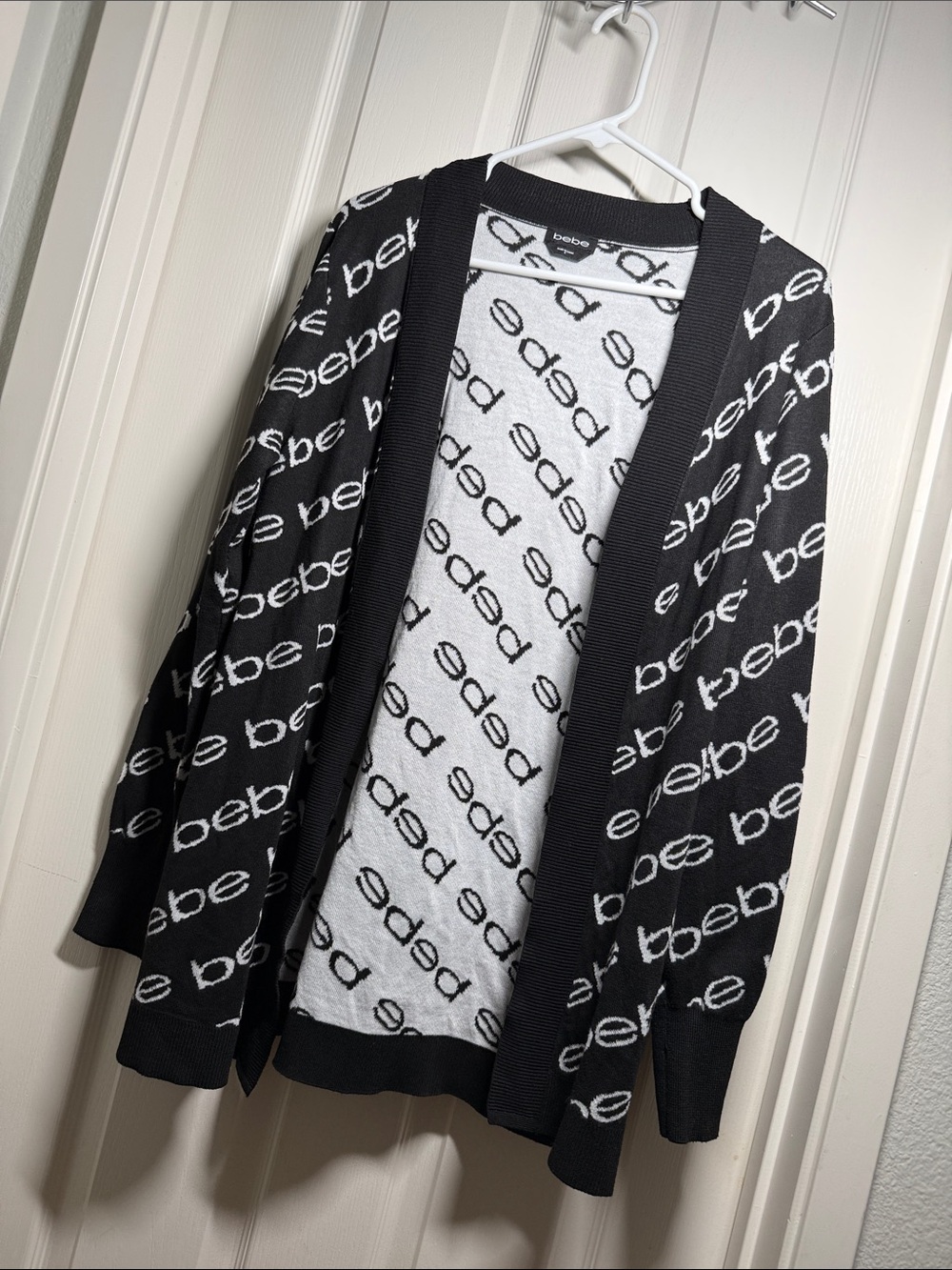 Bebe knit cardigan. Size Small. NWOT